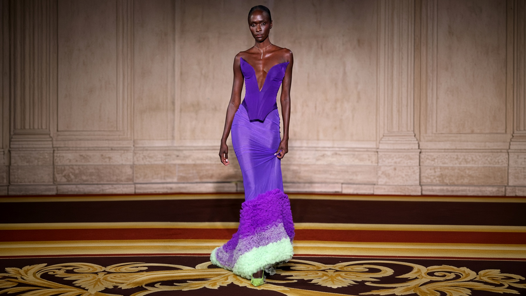 Alani Nu sends an energy drink down the runway