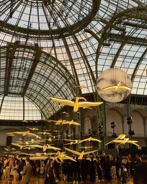Matthieu Blazy Marks One Year at Chanel by Hanging 100 Birds From the Grand Palais Ceiling